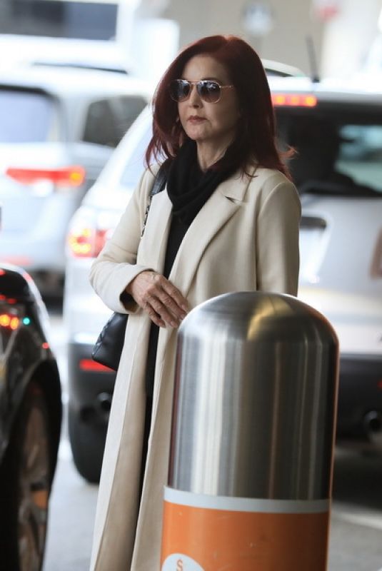 PRISCILLA PRESLEY Arrives at LAX Airport in Los Angeles 12/01/2023