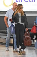 REBECCA and Chris JUDD Arrives Back in Melbourne 12/15/2023