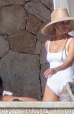 REESE WITHERSPOON in a White Swimsuit in Cabo San Lucas 12/26/2023