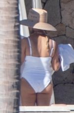 REESE WITHERSPOON in a White Swimsuit in Cabo San Lucas 12/26/2023
