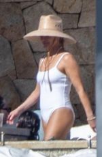 REESE WITHERSPOON in a White Swimsuit in Cabo San Lucas 12/26/2023