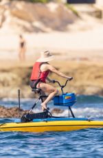 REESE WITHERSPOON Riding Water Bikes in Cabo San Lucas 12/28/2023