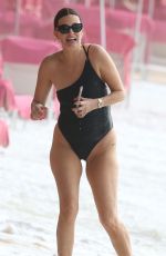 RHEA DURHAM in Swimsuit at a Beach in Barbados 12/24/2023