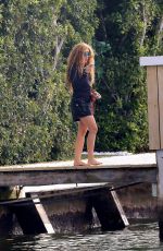 SHAKIRA Out to Make a Phone Call in Miami Beach 12/02/2023
