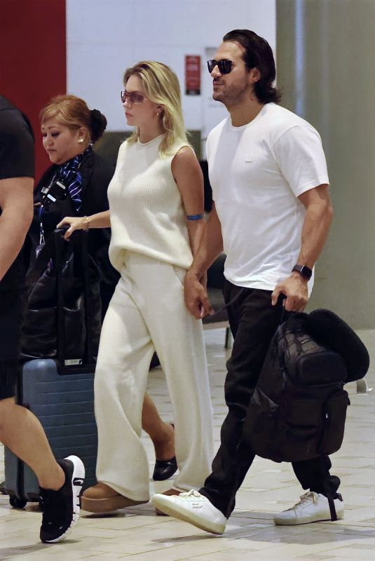 SYDNEY SWEENEY Arrives at Gold Coast Airport in Australia 12/07/2023