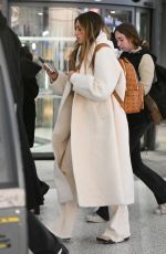TATE MCRAE Arrives at JFK Airport in New York 12/12/2023
