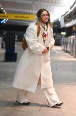 TATE MCRAE Arrives at JFK Airport in New York 12/12/2023