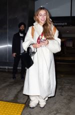 TATE MCRAE Arrives at JFK Airport in New York 12/12/2023