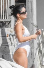 VANESA HUDGENS and SARAH HYLAND in Bikinis at a Beach in Tulum 12/04/2023