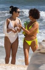 VANESA HUDGENS and SARAH HYLAND in Bikinis at a Beach in Tulum 12/04/2023