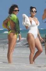 VANESA HUDGENS and SARAH HYLAND in Bikinis at a Beach in Tulum 12/04/2023