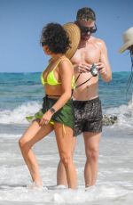 VANESA HUDGENS and SARAH HYLAND in Bikinis at a Beach in Tulum 12/04/2023
