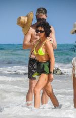 VANESA HUDGENS and SARAH HYLAND in Bikinis at a Beach in Tulum 12/04/2023
