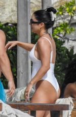 VANESA HUDGENS and SARAH HYLAND in Bikinis at a Beach in Tulum 12/04/2023