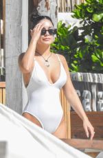 VANESA HUDGENS and SARAH HYLAND in Bikinis at a Beach in Tulum 12/04/2023
