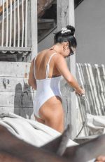 VANESA HUDGENS and SARAH HYLAND in Bikinis at a Beach in Tulum 12/04/2023