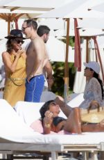 WENDI DENG MURDOCH with Her New Boyfriend on the Beach in St Barts 12/26/2023