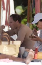 WENDI DENG MURDOCH with Her New Boyfriend on the Beach in St Barts 12/26/2023