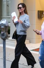 ANGELINA JOLIE Leaves a Friend