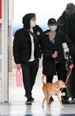 ARIANA GRANDE Arrives at JFK Airport in New York 01/21/2024