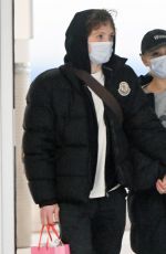 ARIANA GRANDE Arrives at JFK Airport in New York 01/21/2024