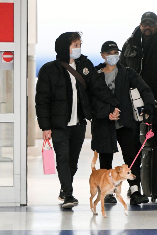 ARIANA GRANDE Arrives at JFK Airport in New York 01/21/2024
