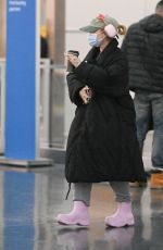 ARIANA GRANDE Arrives at JFK Airport in New York 01/27/2024