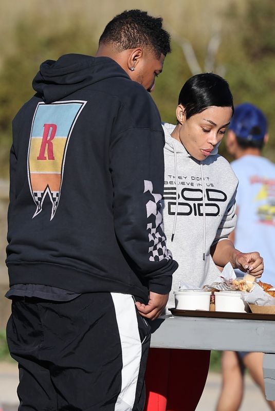 BLAC CHYNA Enjoys a Seaside Meal with a Friend in Malibu 01/11/2024