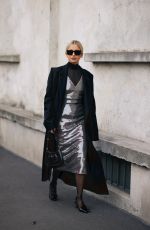 CAROLINE DAUR Arrives at Prada Fashion Show at Milan Fashion Week 01/14/2024