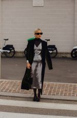 CAROLINE DAUR Arrives at Prada Fashion Show at Milan Fashion Week 01/14/2024
