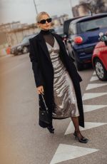 CAROLINE DAUR Arrives at Prada Fashion Show at Milan Fashion Week 01/14/2024