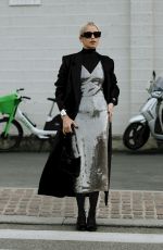 CAROLINE DAUR Arrives at Prada Fashion Show at Milan Fashion Week 01/14/2024