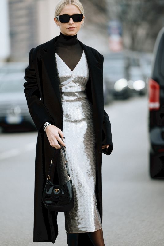 CAROLINE DAUR Arrives at Prada Fashion Show at Milan Fashion Week 01/14/2024