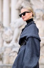 CAROLINE DAUR Arrives at Schiaparelli Spring/Summer 2024 Show at Fashion Week in Paris 01/22/2024