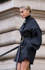 CAROLINE DAUR Arrives at Schiaparelli Spring/Summer 2024 Show at Fashion Week in Paris 01/22/2024
