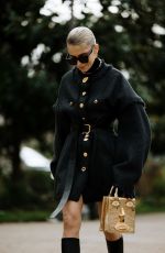 CAROLINE DAUR Arrives at Schiaparelli Spring/Summer 2024 Show at Fashion Week in Paris 01/22/2024