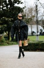 CAROLINE DAUR Arrives at Schiaparelli Spring/Summer 2024 Show at Fashion Week in Paris 01/22/2024