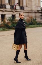 CAROLINE DAUR Arrives at Schiaparelli Spring/Summer 2024 Show at Fashion Week in Paris 01/22/2024