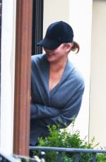 CHRISSY TEIGEN Shares a Moment of Laughter in New York 01/26/2024