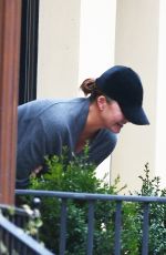 CHRISSY TEIGEN Shares a Moment of Laughter in New York 01/26/2024