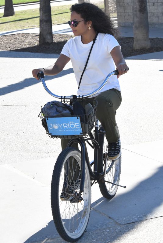 CHRISTINA MILIAN Enjoys a Bike Ride on New Years Day in Santa Monica 01/01/2024