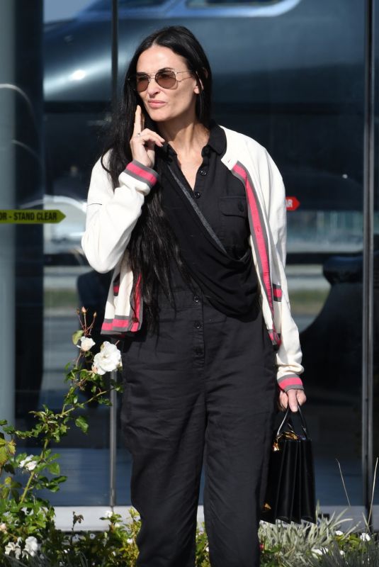 DEMI MOORE Reunites with Chihuahua Pilaf after Puerto Vallarta Vacation 01/15/2024