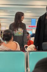 EMILY RATAJKOWSKI and Moses Sumney Rring in New Year in Cayman Islands 01/02/2024