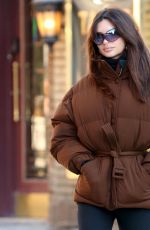 EMILY RATAJKOWSKI Out for Breakfast in a Brown Puffer Coat and Black Pants in New York 01/22/2024