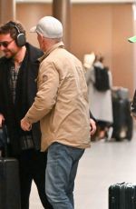 GIGI HADID and Bradley Cooper at Airport in New York 01/23/2024