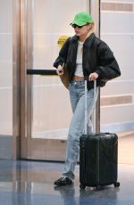 GIGI HADID and Bradley Cooper at Airport in New York 01/23/2024