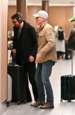 GIGI HADID and Bradley Cooper at Airport in New York 01/23/2024