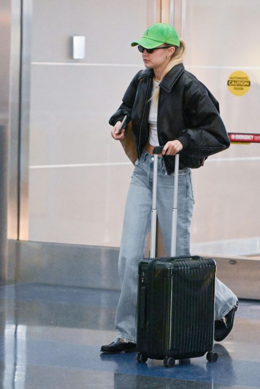 GIGI HADID and Bradley Cooper at Airport in New York 01/23/2024