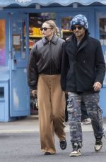 GIGI HADID and Bradley Cooper Out in New York 01/25/2024