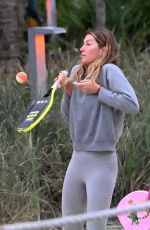 GISELE BUNDCHEN Playing Beach Tennis in Miami 01/17/2024